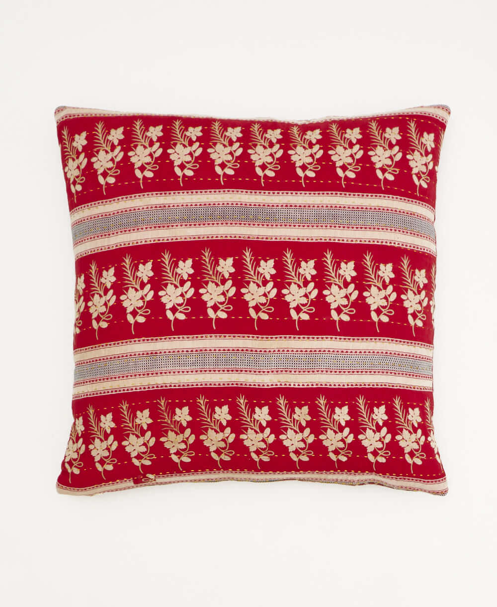 colorful throw pillow in cherry red made from vintage fabrics with hand-stitched embroidery in tan medallion print