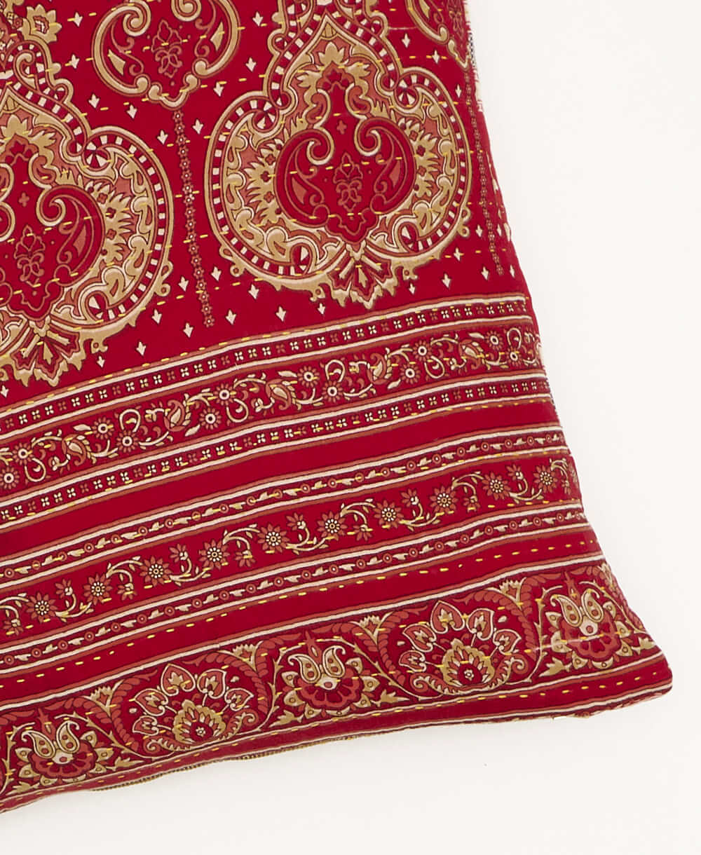 kantha square pillow in cherry red with tan medallion pattern with orange embroidery