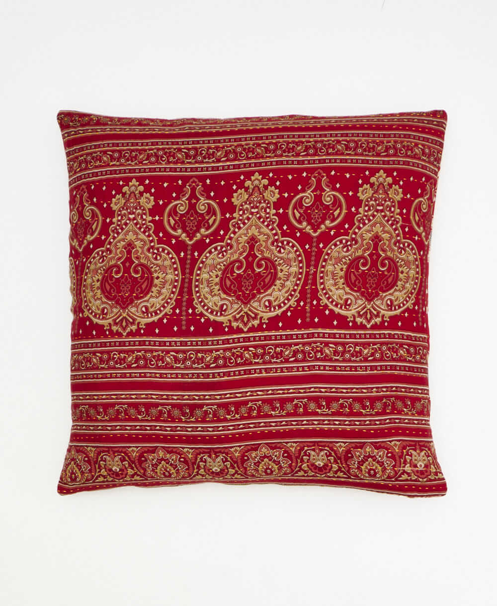 cherry red throw pillow with a tan medallion print made from vintage cotton saris in India