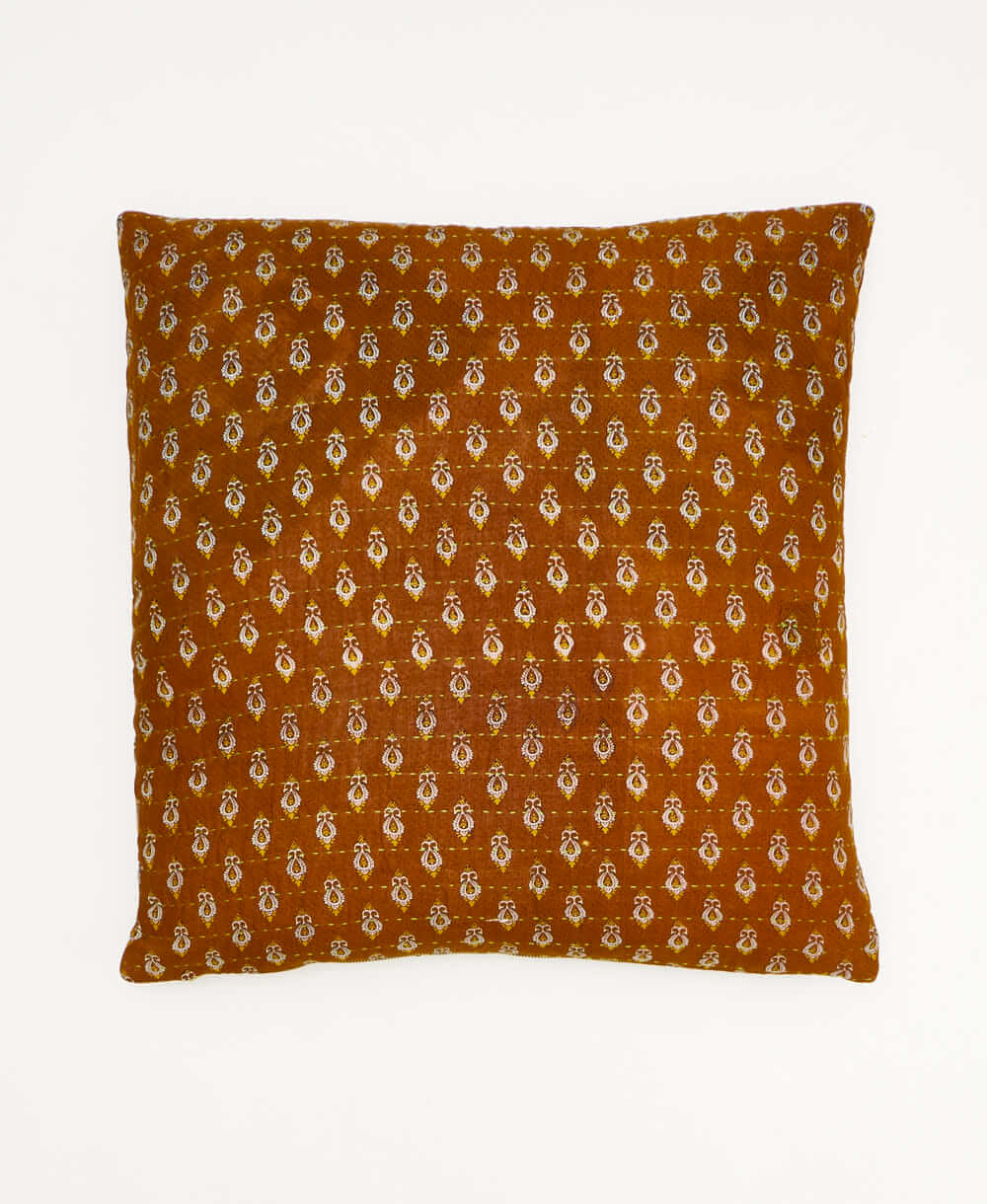 colorful throw pillow in camel made from vintage fabrics with hand-stitched embroidery in mustard yellow daisy print