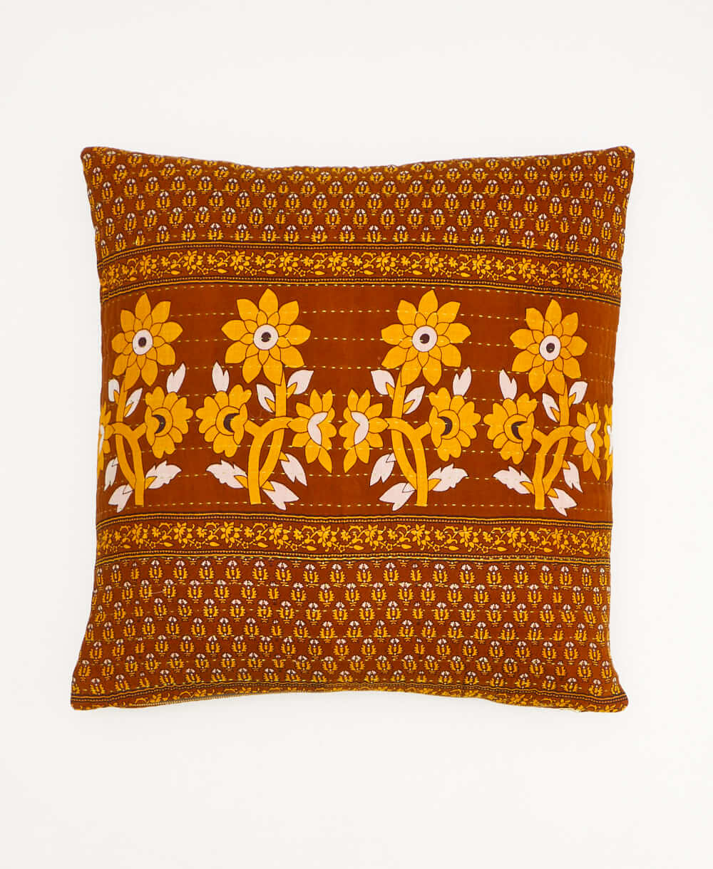 camel throw pillow with a mustard yellow daisy print made from vintage cotton saris in India