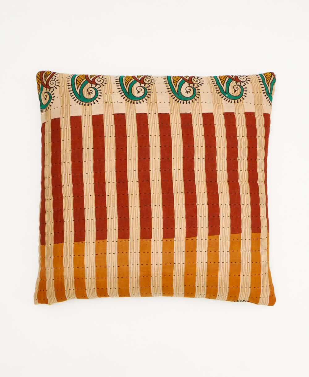 colorful throw pillow in tan made from vintage fabrics with hand-stitched embroidery in emerald & rust floral print