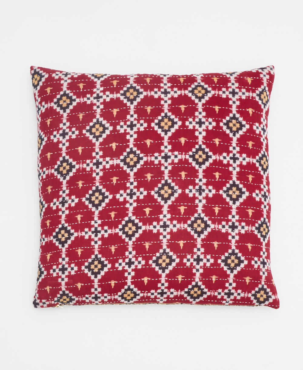 red, white & black diamond vintage throw pillow made from sustainable fabrics with orange embroidery