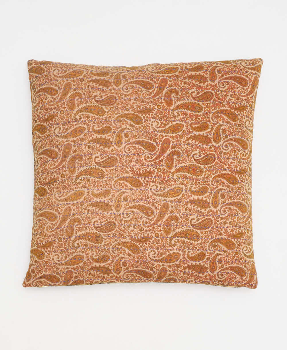 orange paisley vintage throw pillow made from sustainable fabrics with blue embroidery