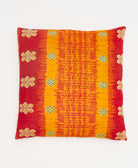 red & orange stripe vintage throw pillow made from sustainable fabrics with black embroidery