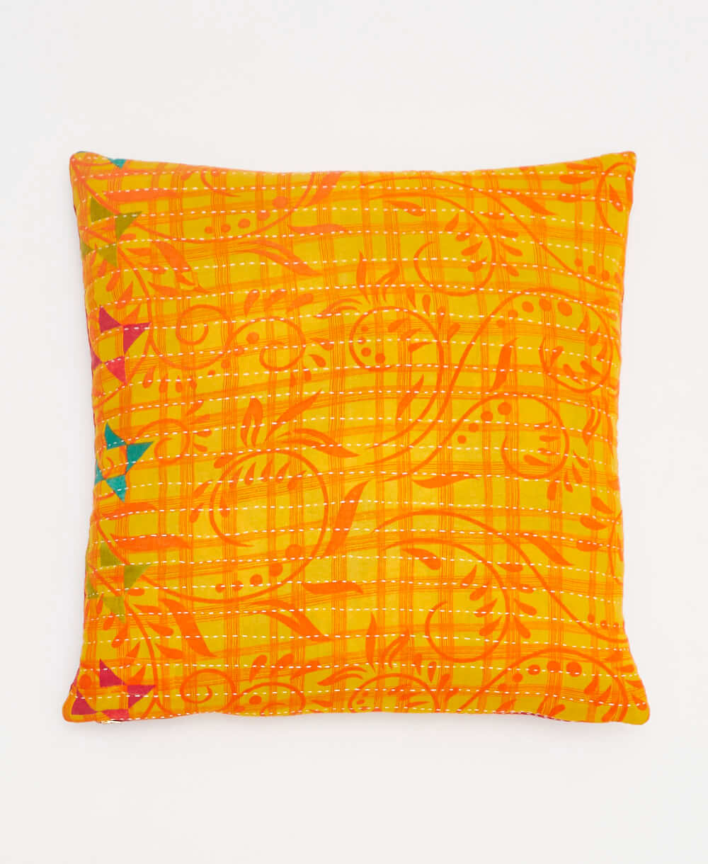 orange & yellow swirling plaid stripe vintage throw pillow made from sustainable fabrics with white embroidery