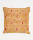 light tan, red & yellow repeating paisley vintage throw pillow made from sustainable fabrics with white embroidery