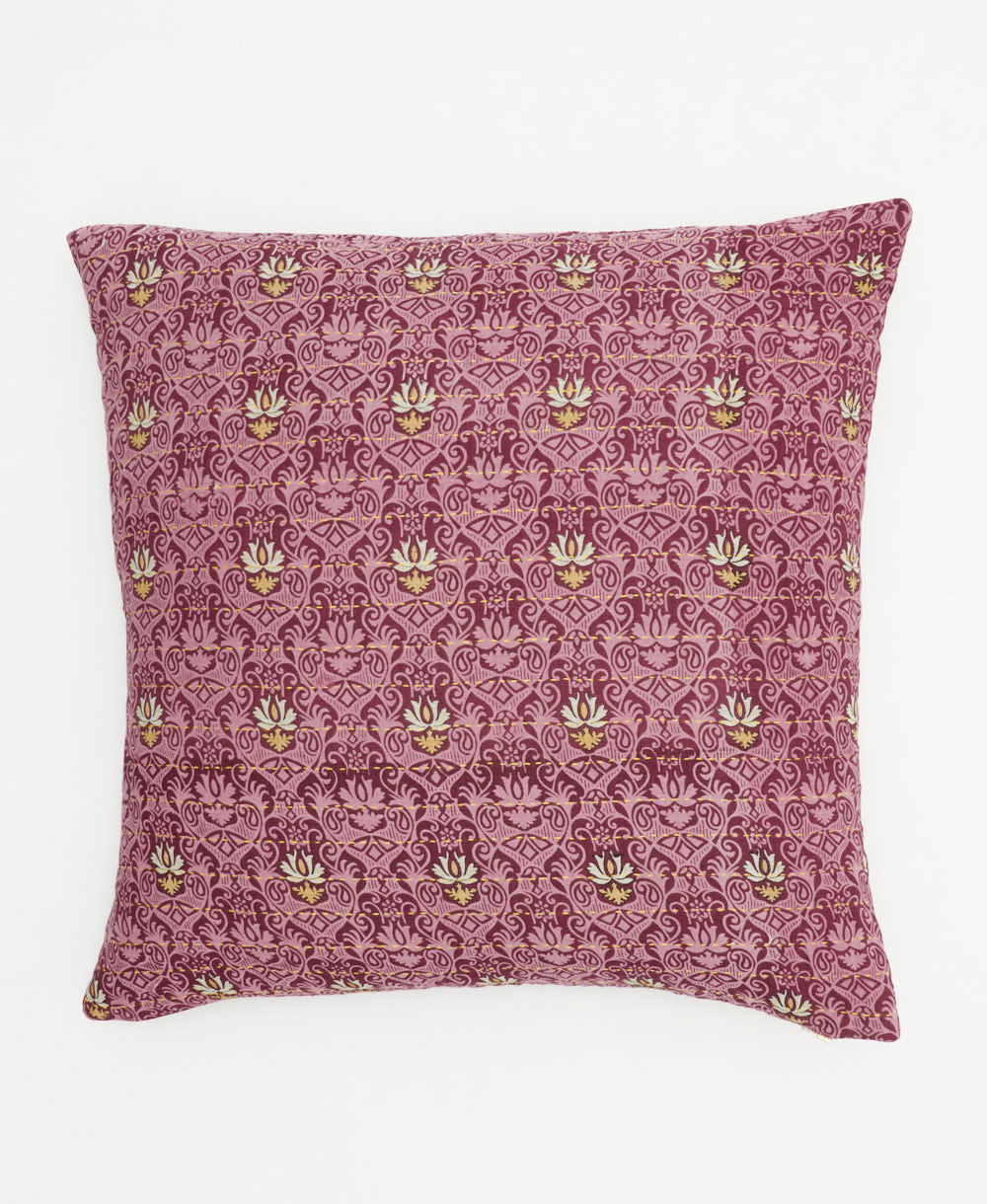 light purple throw pillow with damask pattern