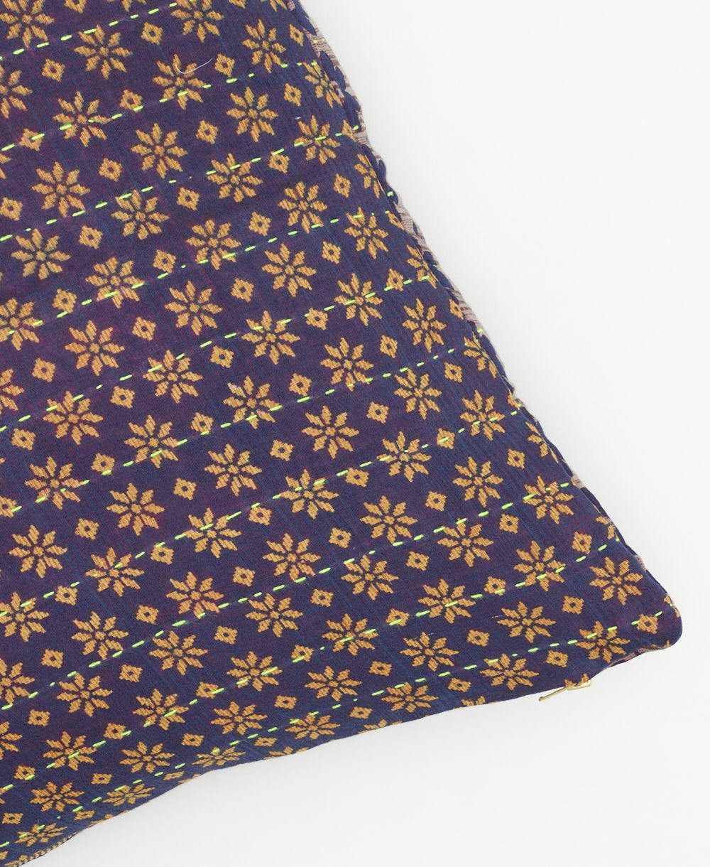 eggplant purple square pillow with light tan star pattern pattern