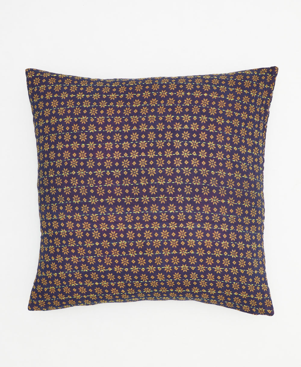 eggplant purple throw pillow with light tan star pattern