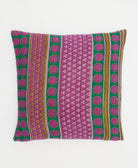 purple & green throw pillow in polka dots & stripes