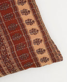 brown square pillow with sandy beige stripes