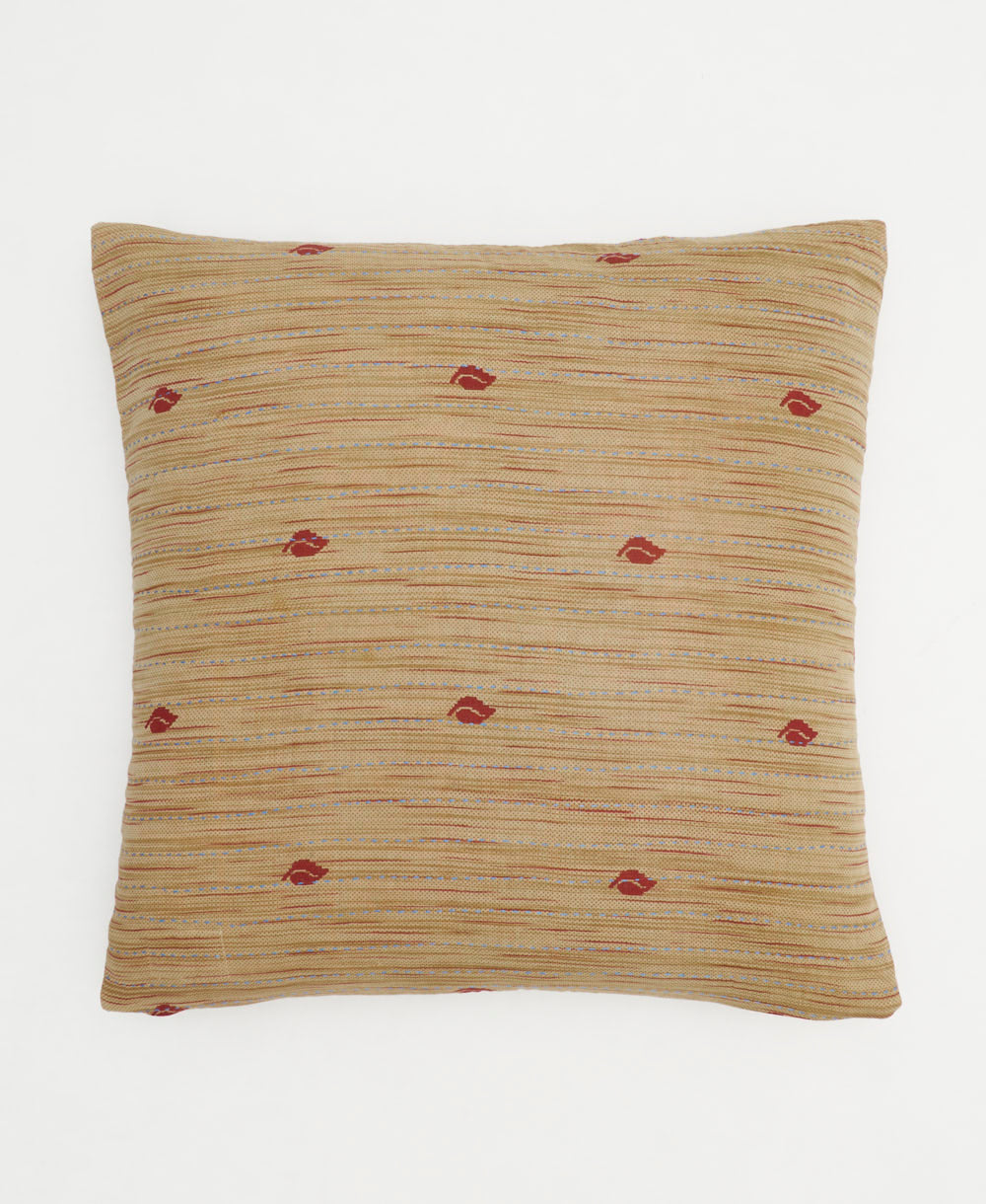 colorful throw pillow in light beige with tan & green diamonds