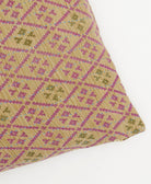 square pillow in beige with purple diamond pattern