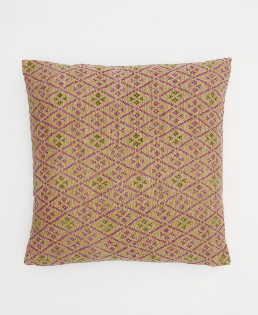 beige & purple throw pillow in diamond pattern