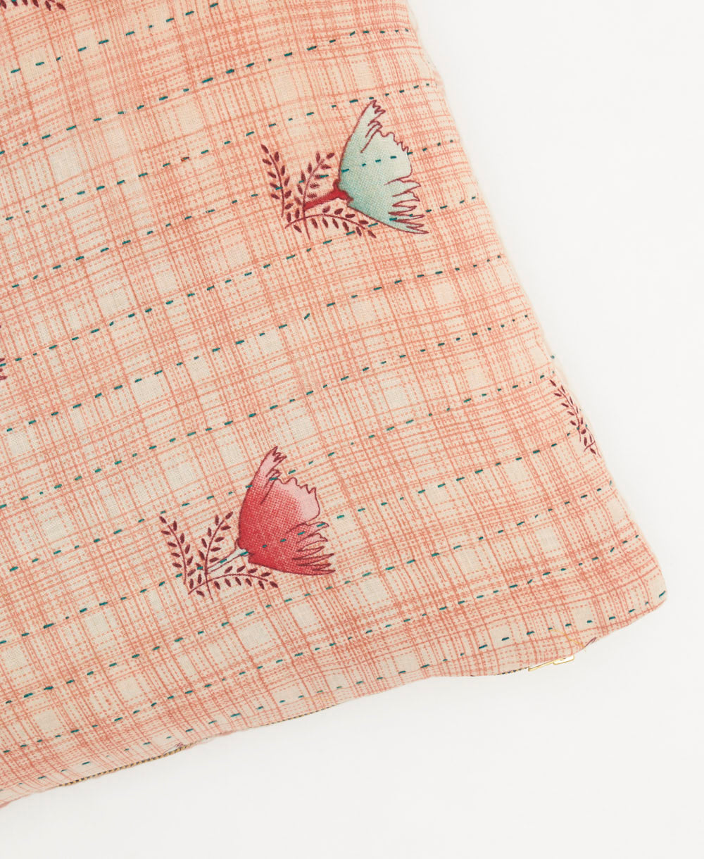 coral square pillow with a light blue & red tulip floral pattern