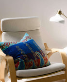 blue square pillow in modern light wooden and light grey armchair by Anchal