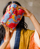 handmade toiletry bag with hand-embroidery and lined with canvas