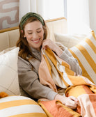 woman wearing cotton twist headband in olive green
