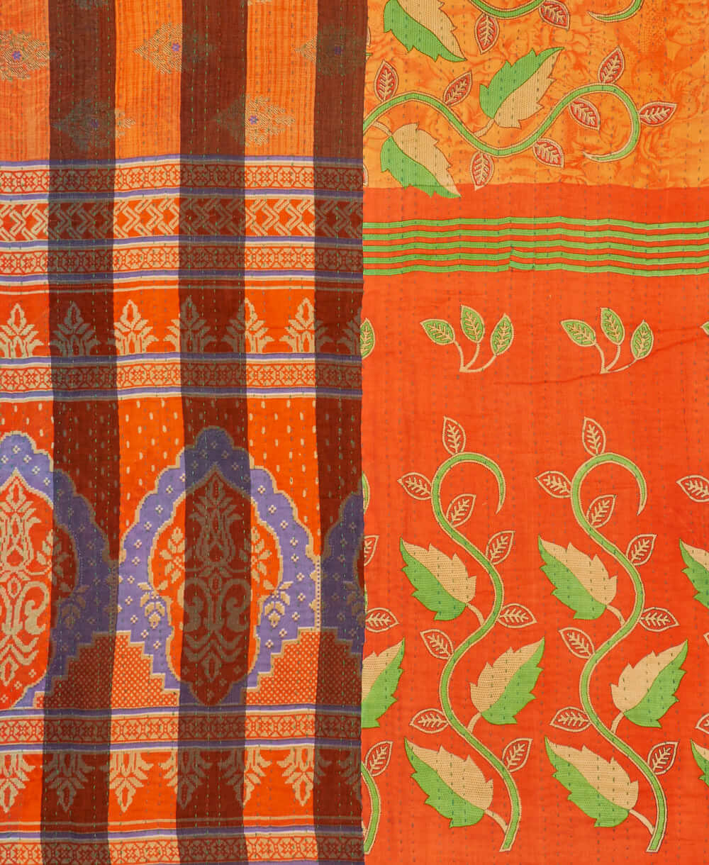 sustainable kantha quilt in king size with orange & lime green vines pattern made in India