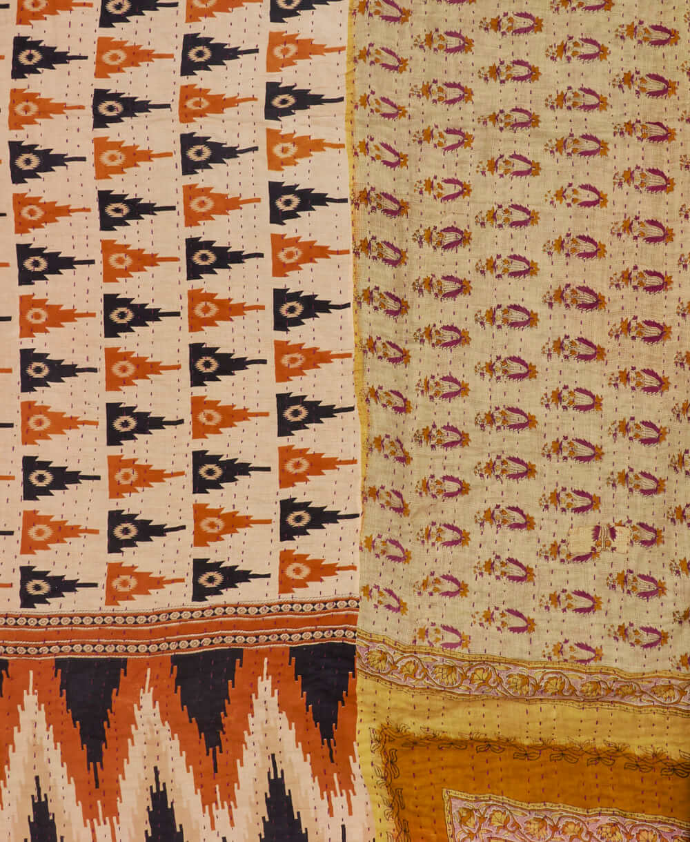 soft king kantha blanket in a tan, orange & black chevron print made from upcycled vintage cotton saris