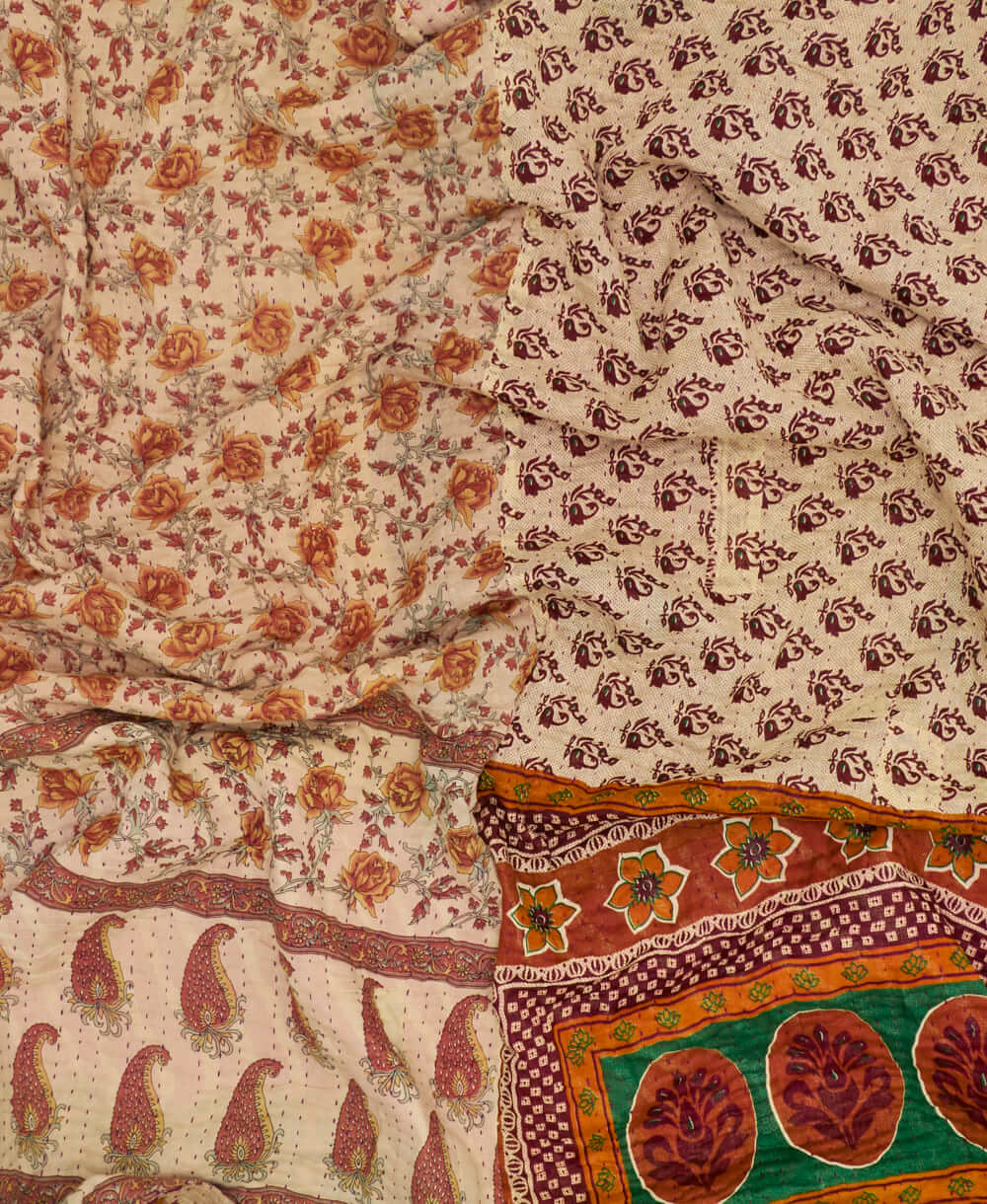 sustainable kantha quilt in king size with tan, orange & black chevron pattern made in India