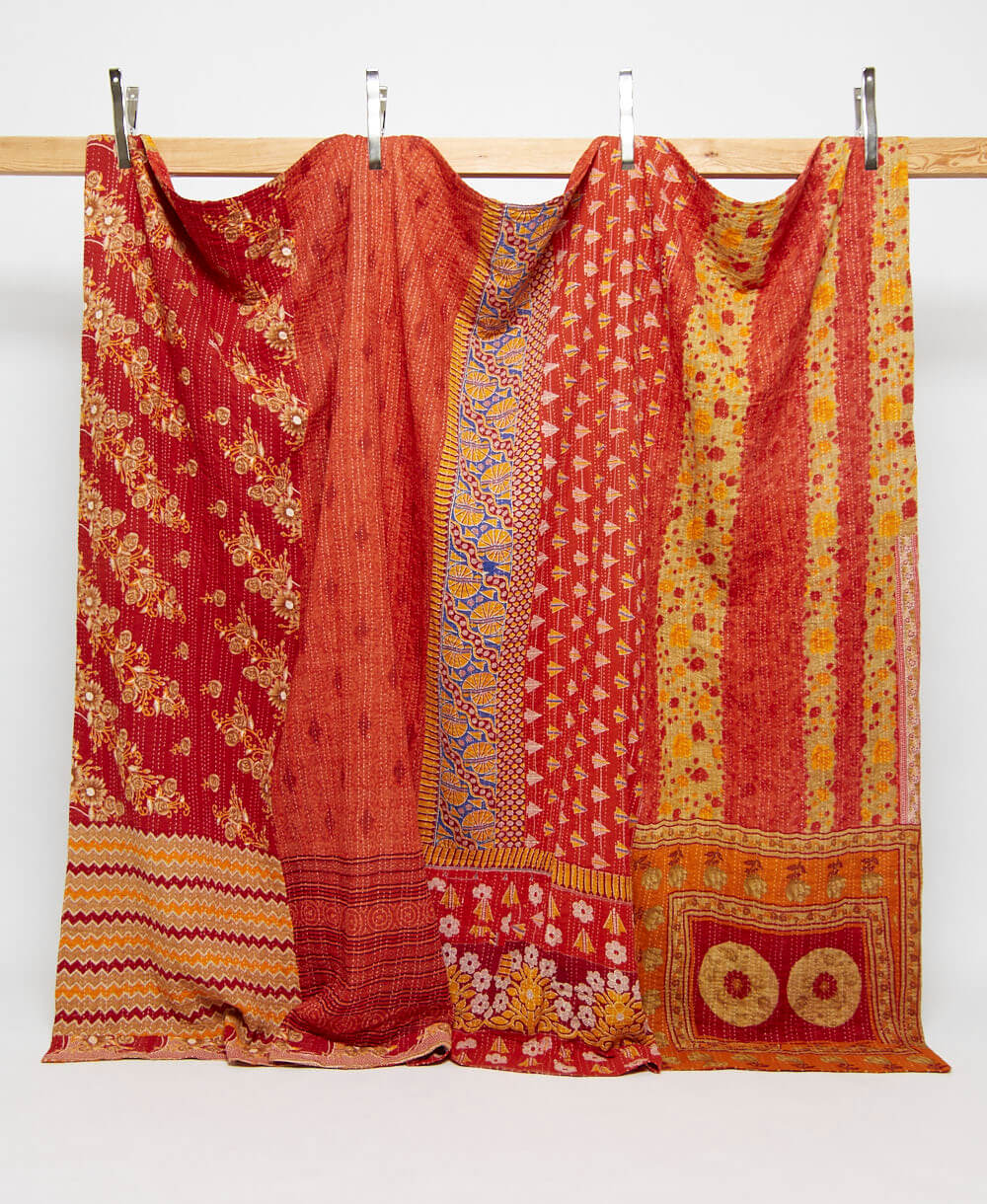 candy red king kantha quilt in bold striped floral pattern handmade in India