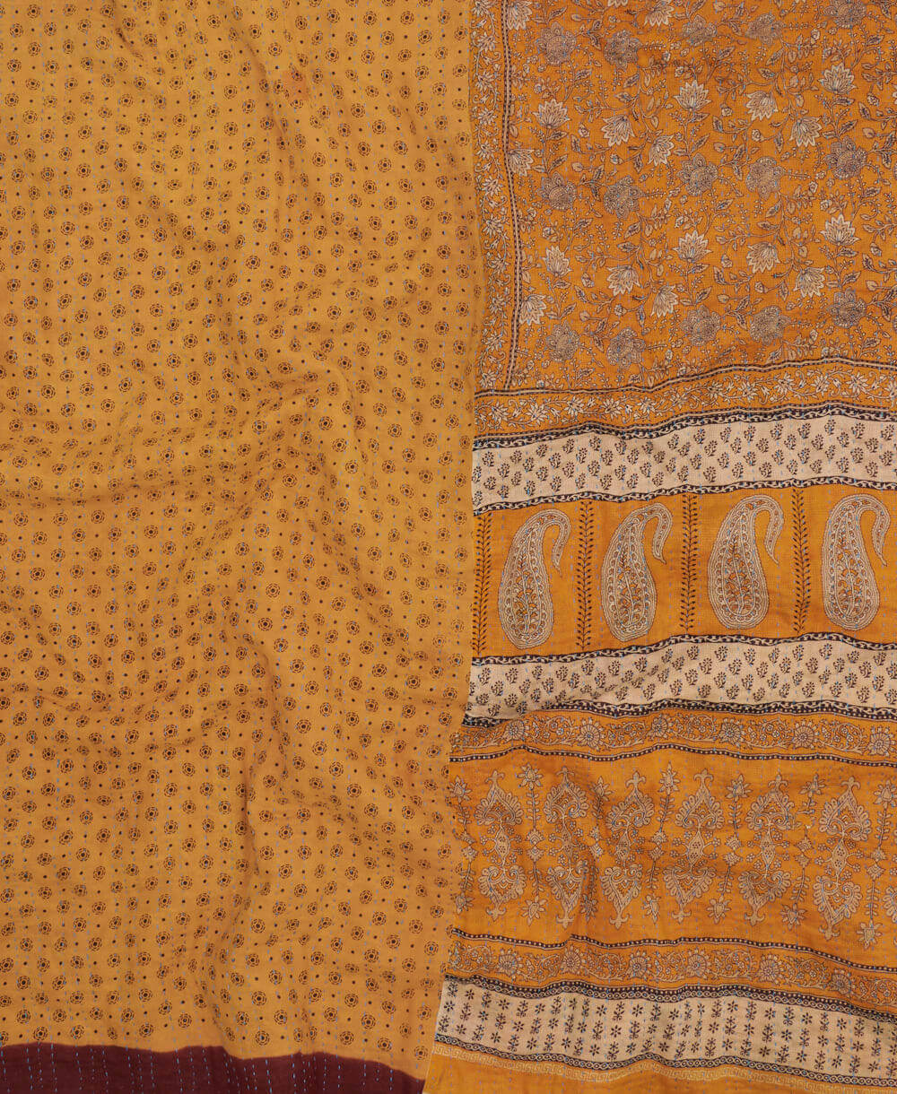 sustainable kantha quilt in king size with a mustard yellow & red floral pattern made in India