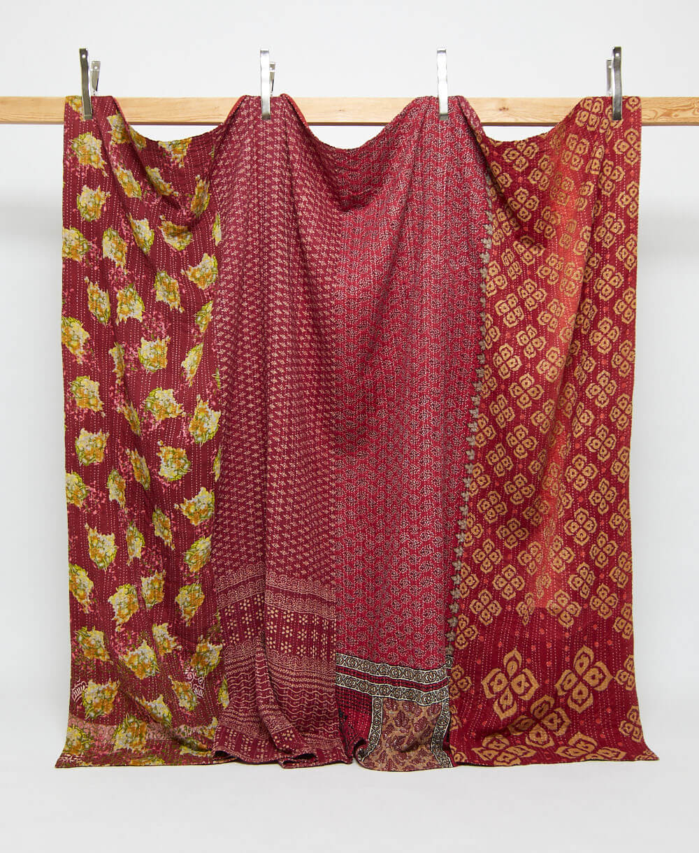 garnet red king kantha quilt in a floral pattern handmade in India