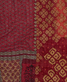 sustainable kantha quilt in king size with a garnet red floral pattern made in India