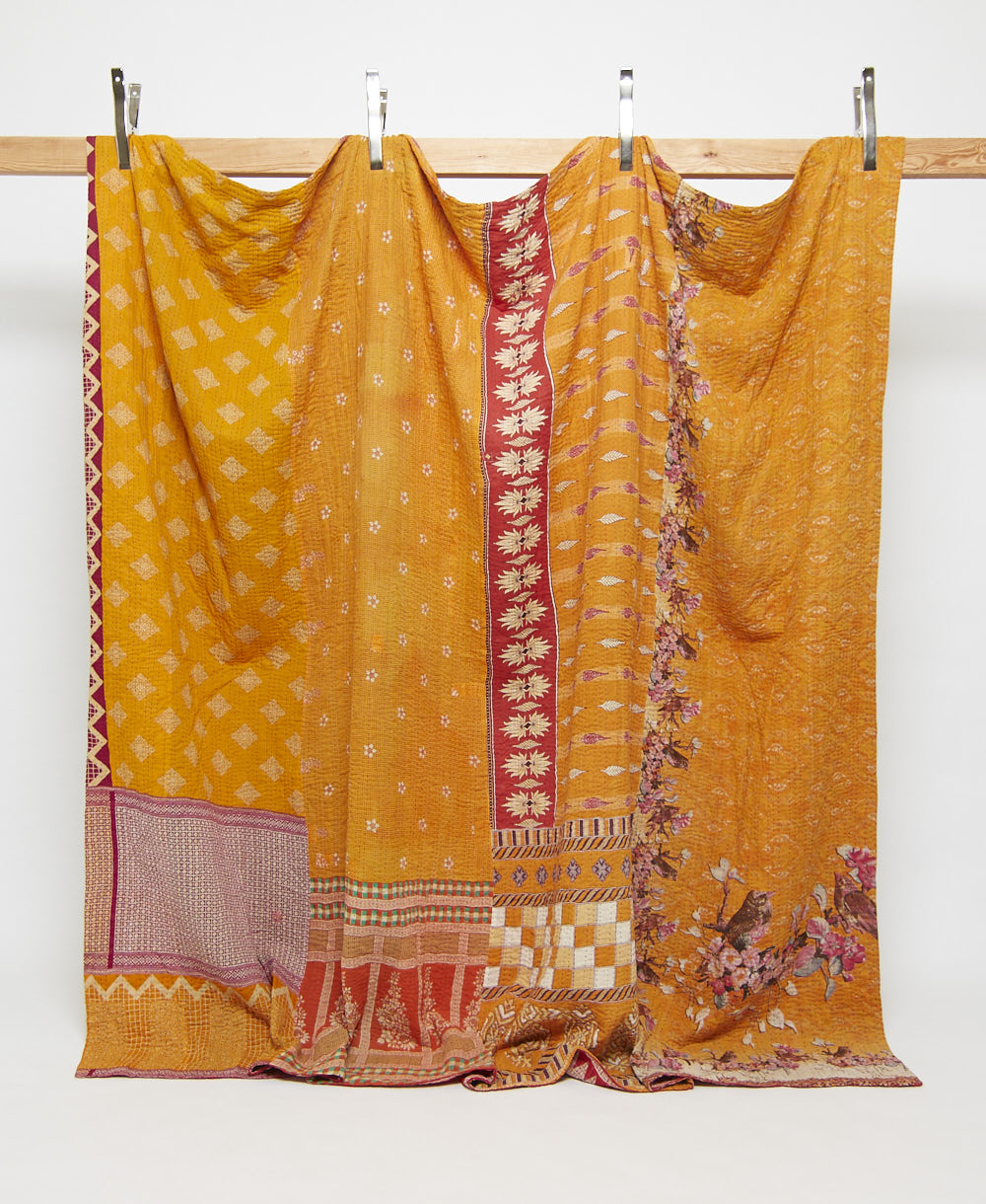 marigold king kantha quilt in a floral pattern handmade in India