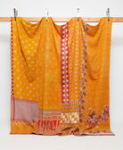 marigold king kantha quilt in a floral pattern handmade in India