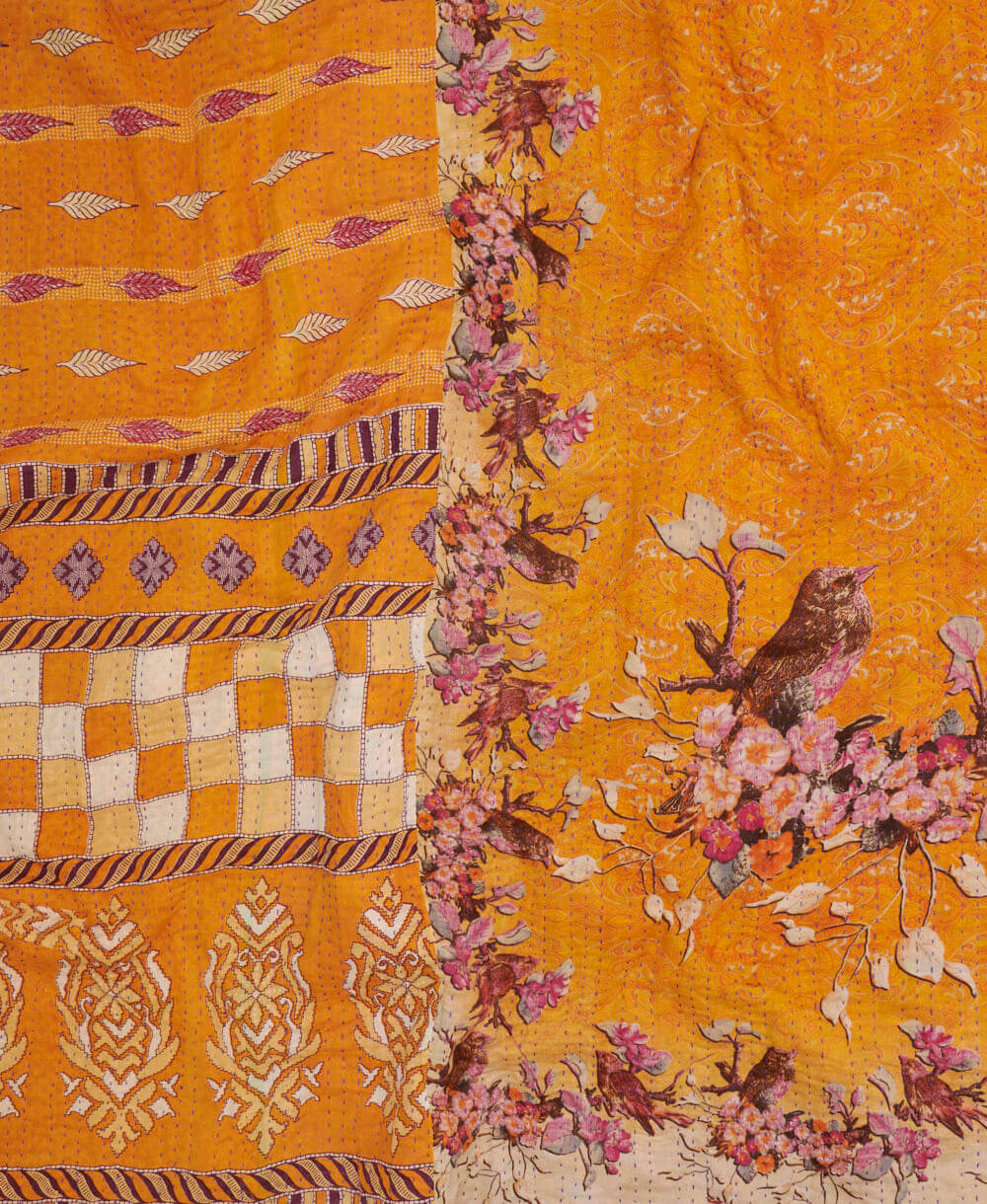 soft king kantha blanket in a marigold floral print made from upcycled vintage cotton saris