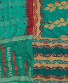 sustainable kantha quilt in king size with a bright teal tie dye pattern made in India