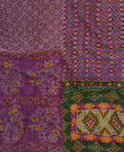 sustainable kantha quilt in king size with a eggplant purple diamond pattern made in India