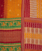 sustainable kantha quilt in king size with a golden yellow polka dot pattern made in India