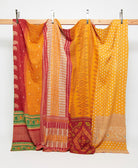 golden yellow king kantha quilt in a polka dot pattern handmade in India