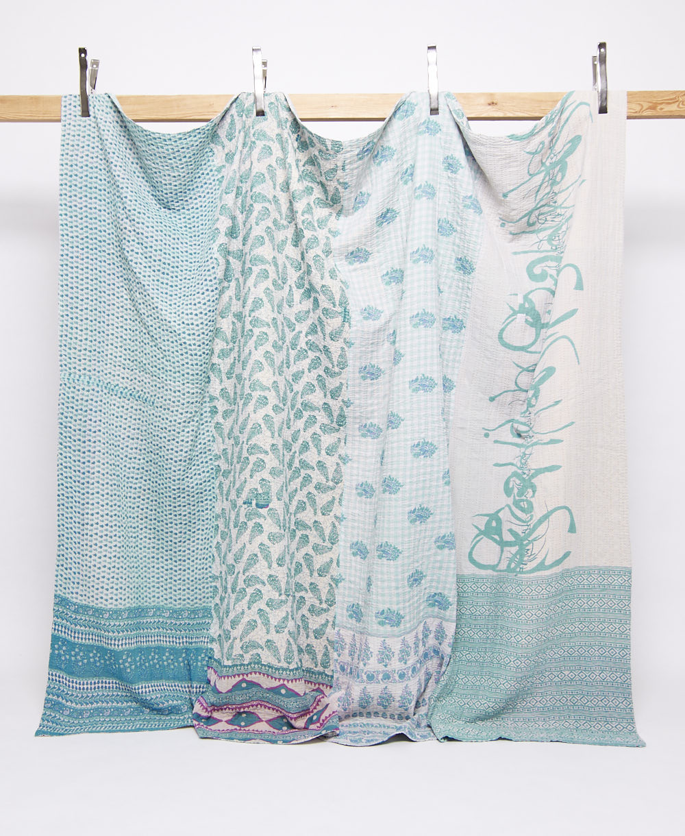 pastel blue king kantha quilt in a gingham pattern handmade in India