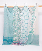 pastel blue king kantha quilt in a gingham pattern handmade in India