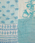 soft king kantha blanket in a pastel blue gingham print made from upcycled vintage cotton saris