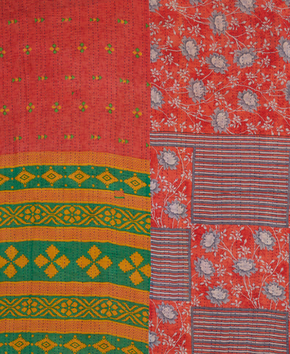 sustainable kantha quilt in king size with a coral swirl pattern made in India