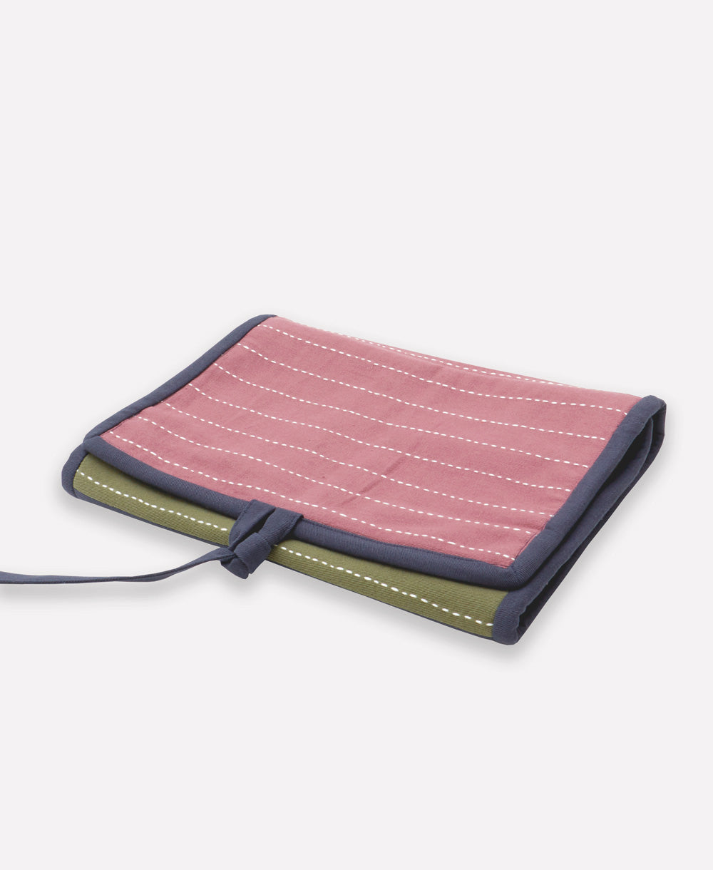 foldable travel organizer made from organic cotton with navy blue, plum purple and pine green