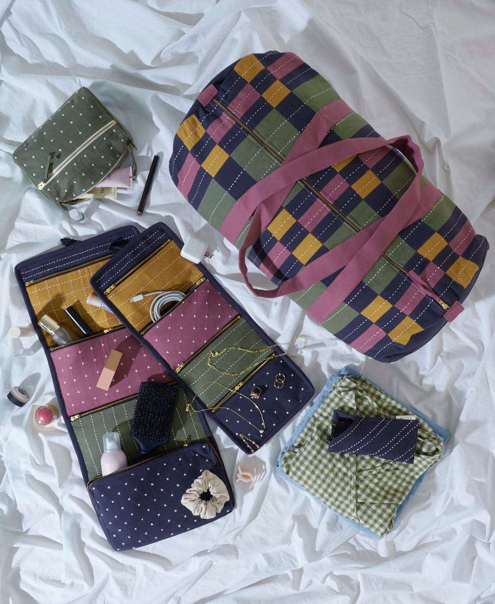 Set of fabric bags and organizers with checkered pattern on a white background