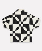 bold black and white checkered modern quilted jacket in sleek cocoon silhouette