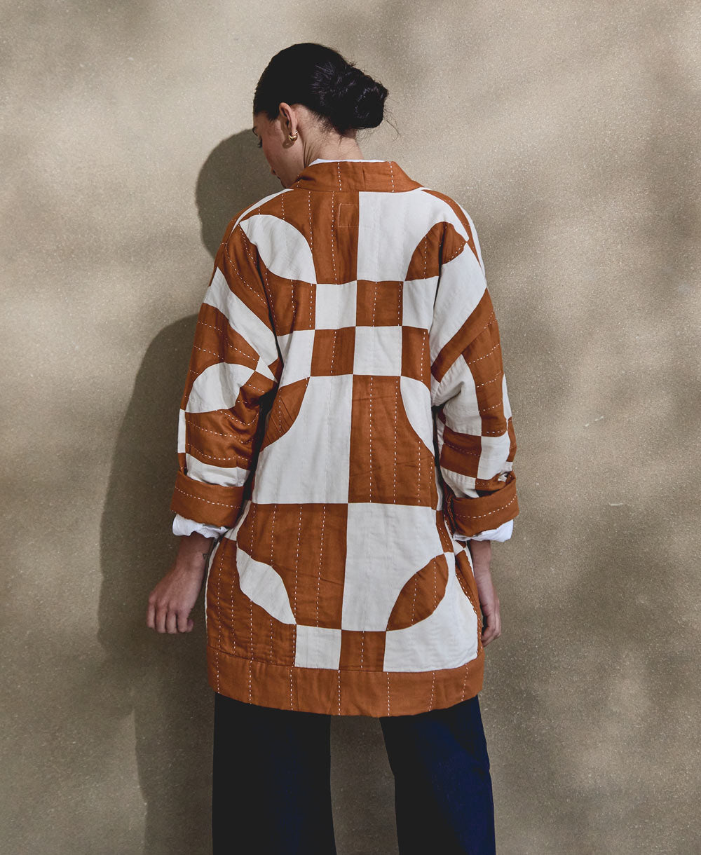 unique pattern camel and white quilted jacket made from 100% organic cotton in India by women artisans