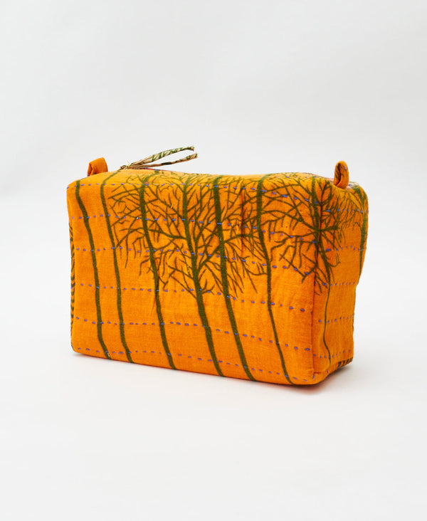 Orange and green abstract vintage kantha toiletry bag featuring blue
traditional kantha hand stitching
