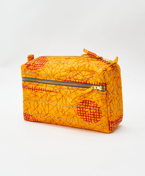 Orange and red abstract vintage kantha toiletry bag handmade using recycled
vintage cotton saris
