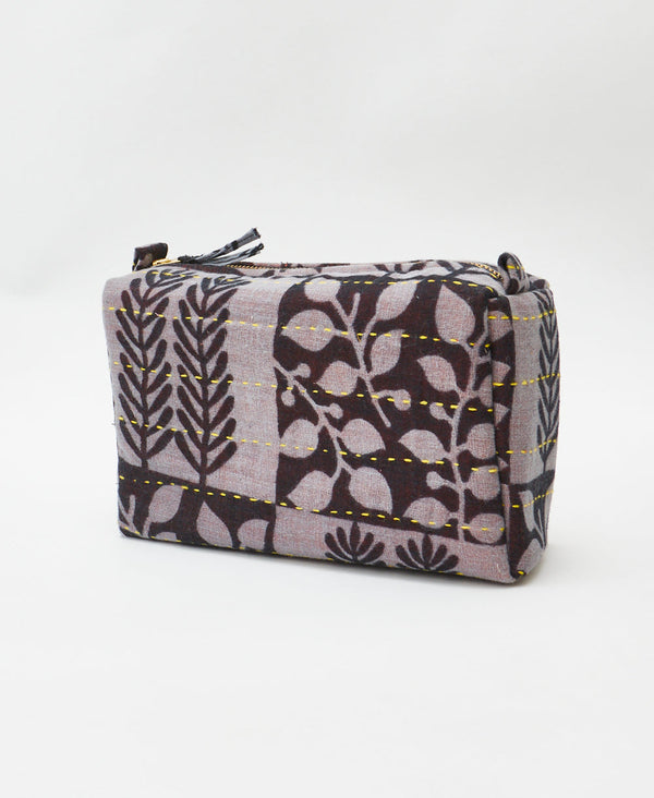 Grey and black leaf print vintage kantha toiletry bag featuring yellow
traditional kantha hand stitching
