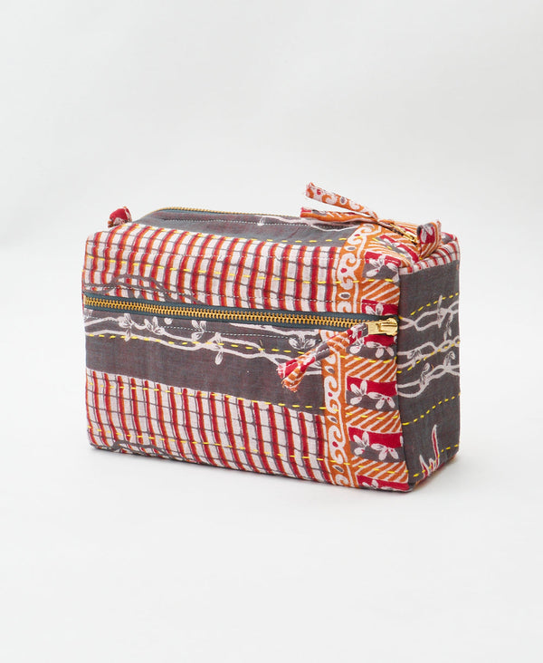 Orange and red abstract print vintage kantha toiletry bag handmade using recycled
vintage cotton saris
