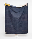 handmade modern quilted throw with solid navy blue backing handmade in India by women artisans